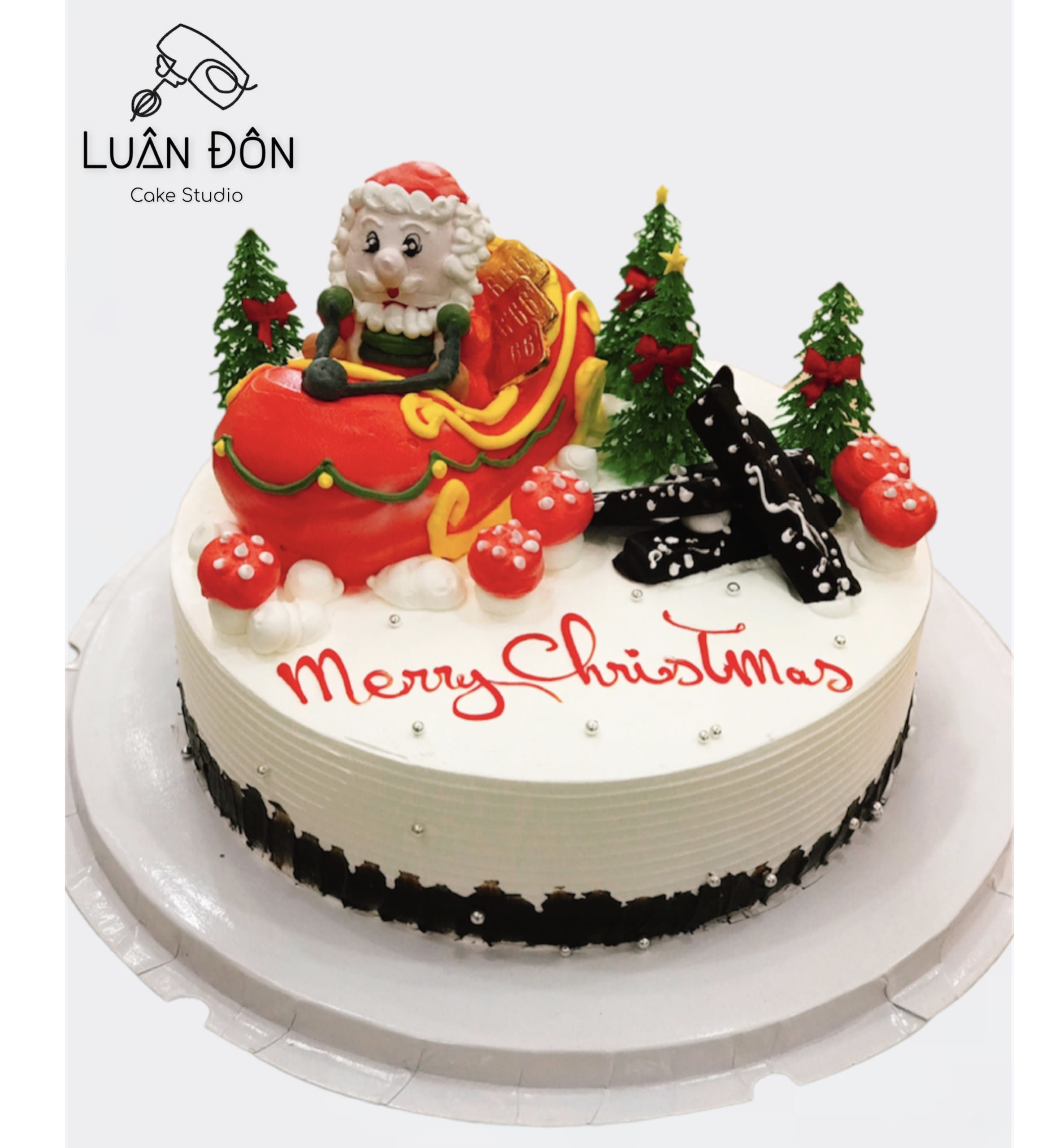 Bánh kem Noel ông già tuyết cưỡi xe tuần lộc