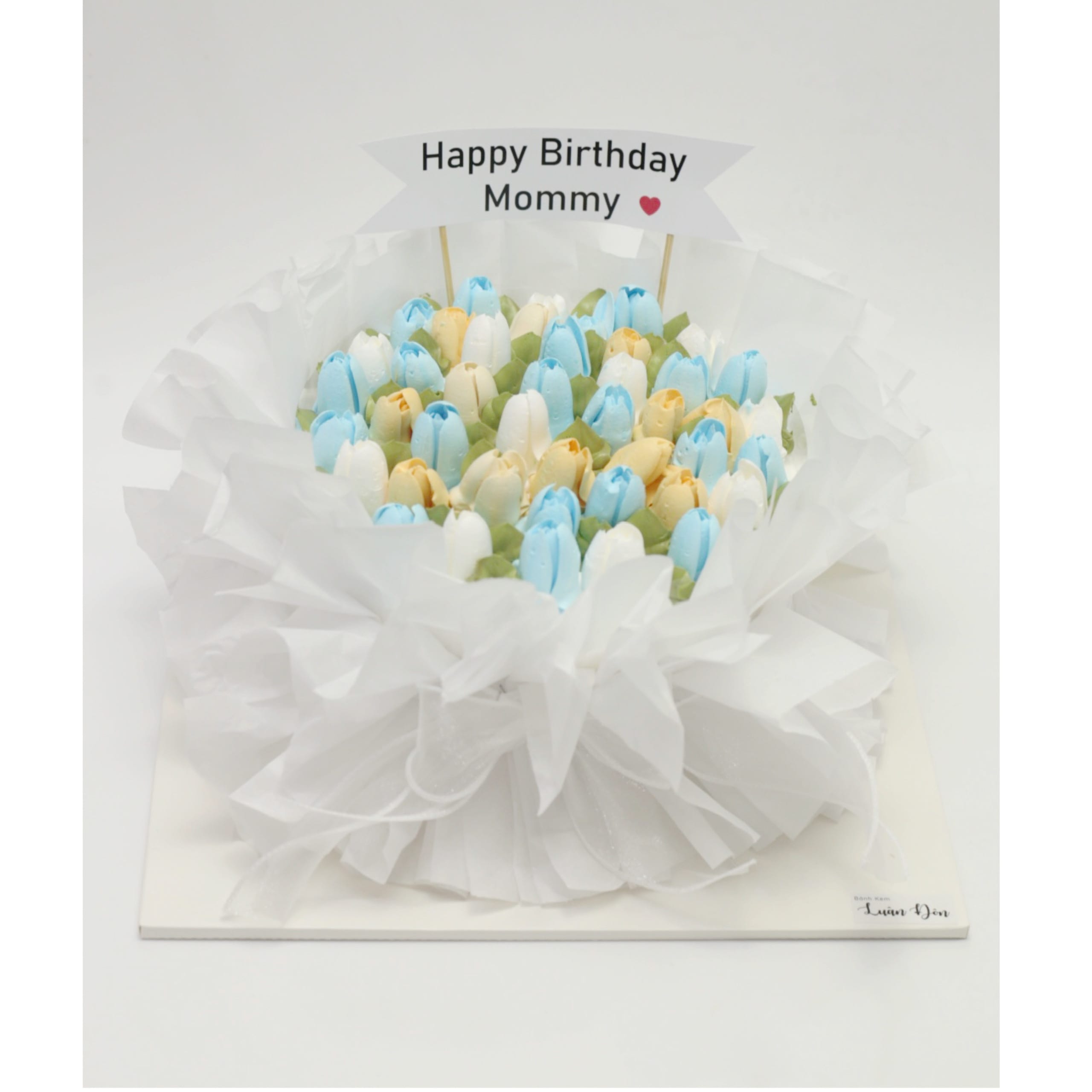 Bánh kem bó hoa tulip xanh trắng nhẹ nhàng