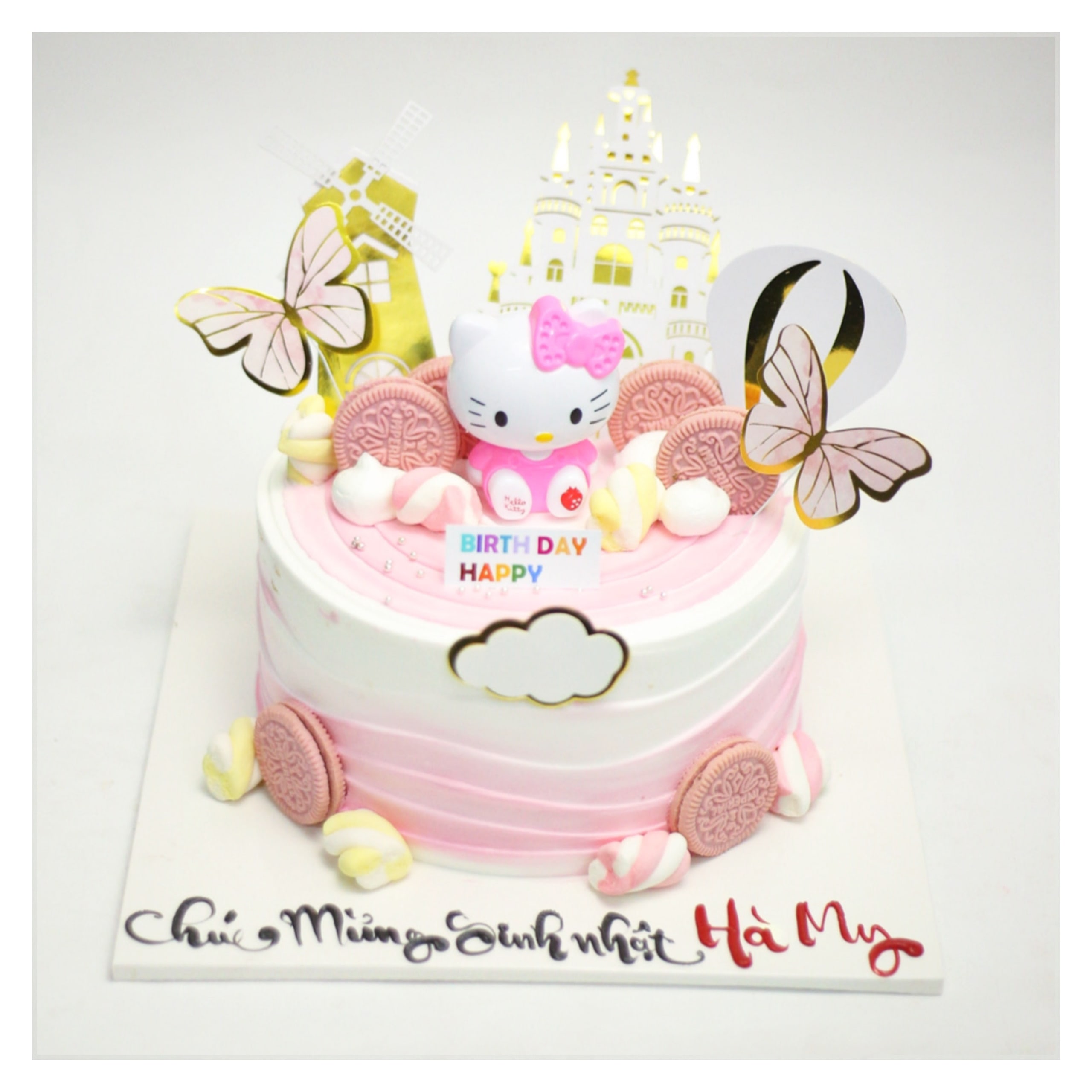 Bánh kem Hello Kitty màu hồng họa tiết lâu đài