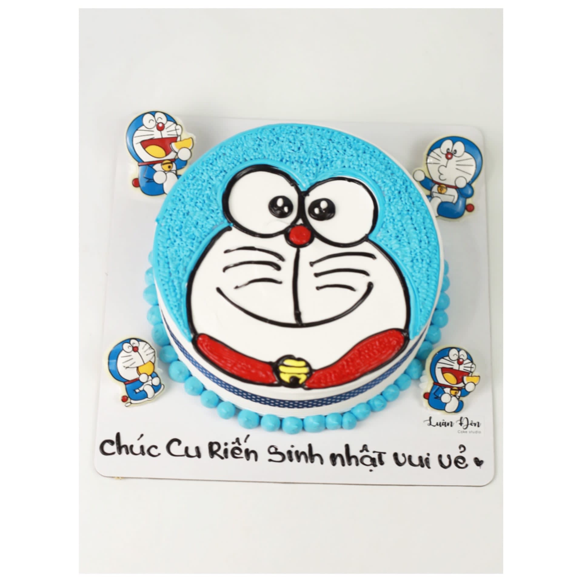 Bánh kem Doraemon mặt cười xanh đại dương
