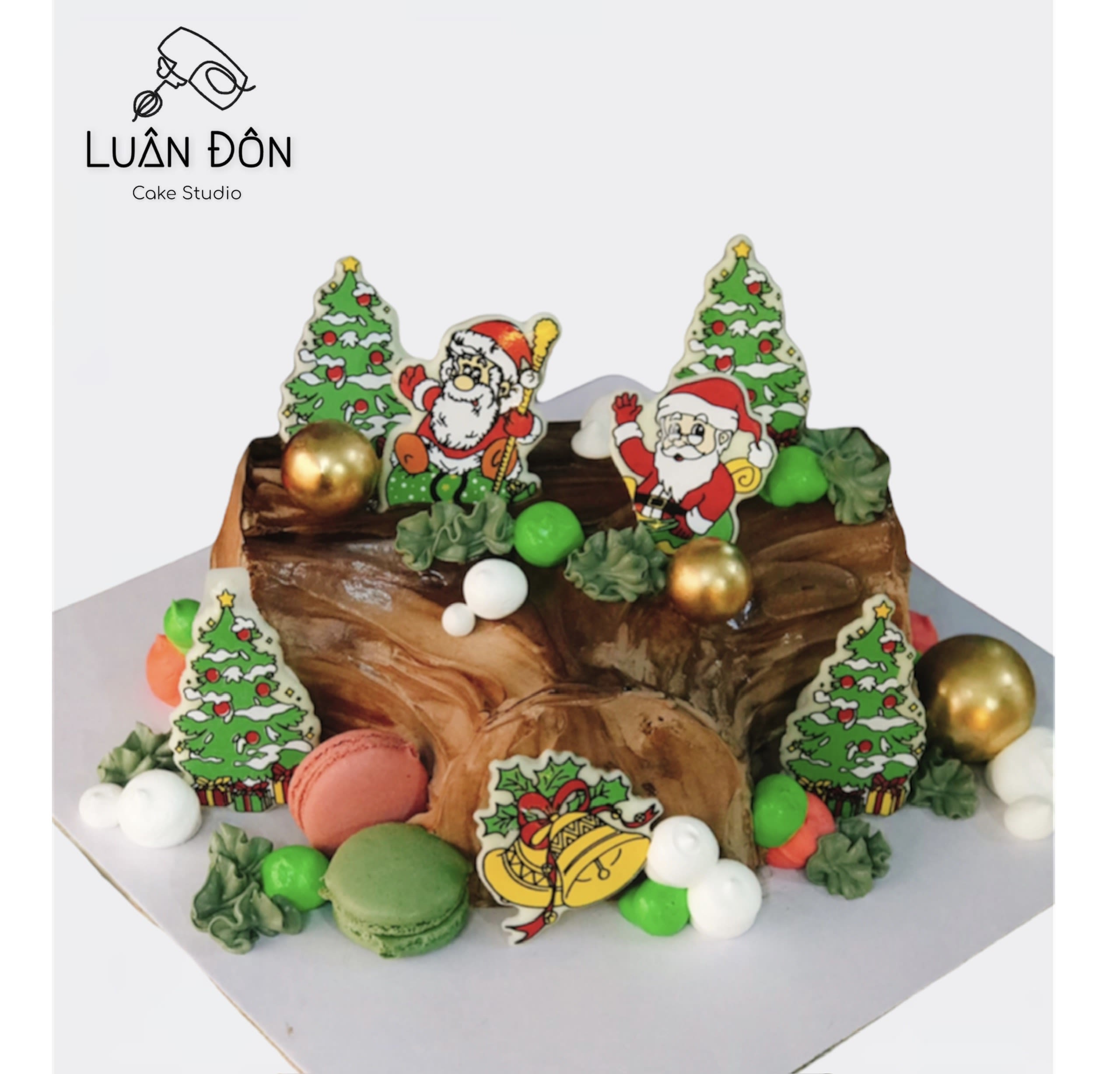 Bánh khúc cây Noel trang trí ông già Noel