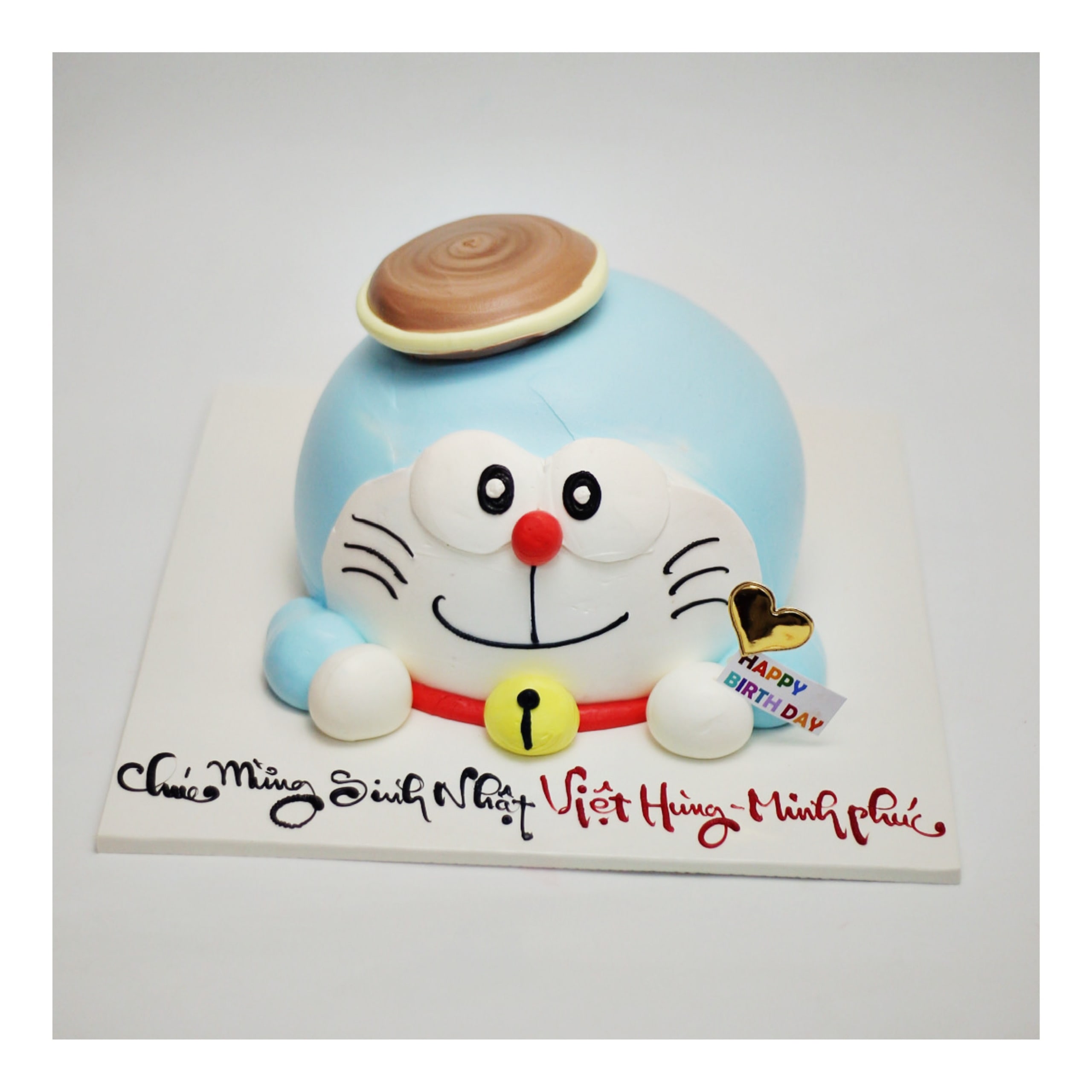 Bánh kem tạo hình mặt mèo máy Doraemon