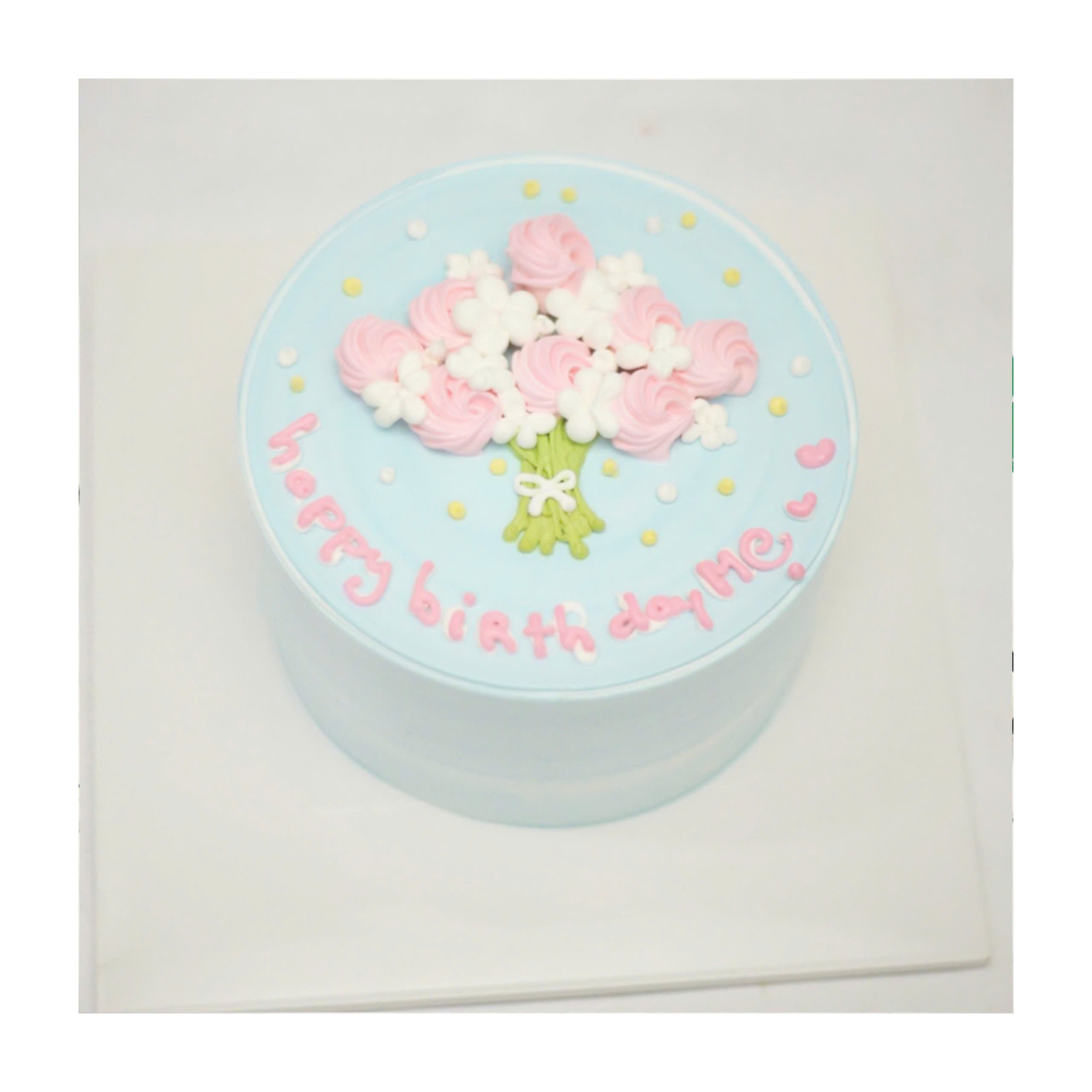 Bánh kem xanh pastel trang trí bó hoa
