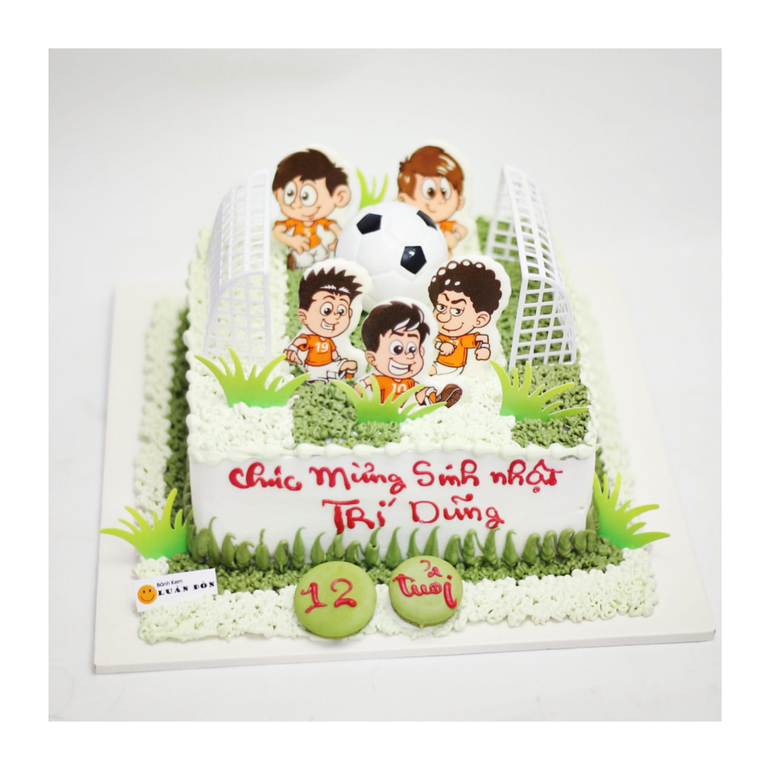 Bánh kem sân cỏ bóng đá cho bé trai