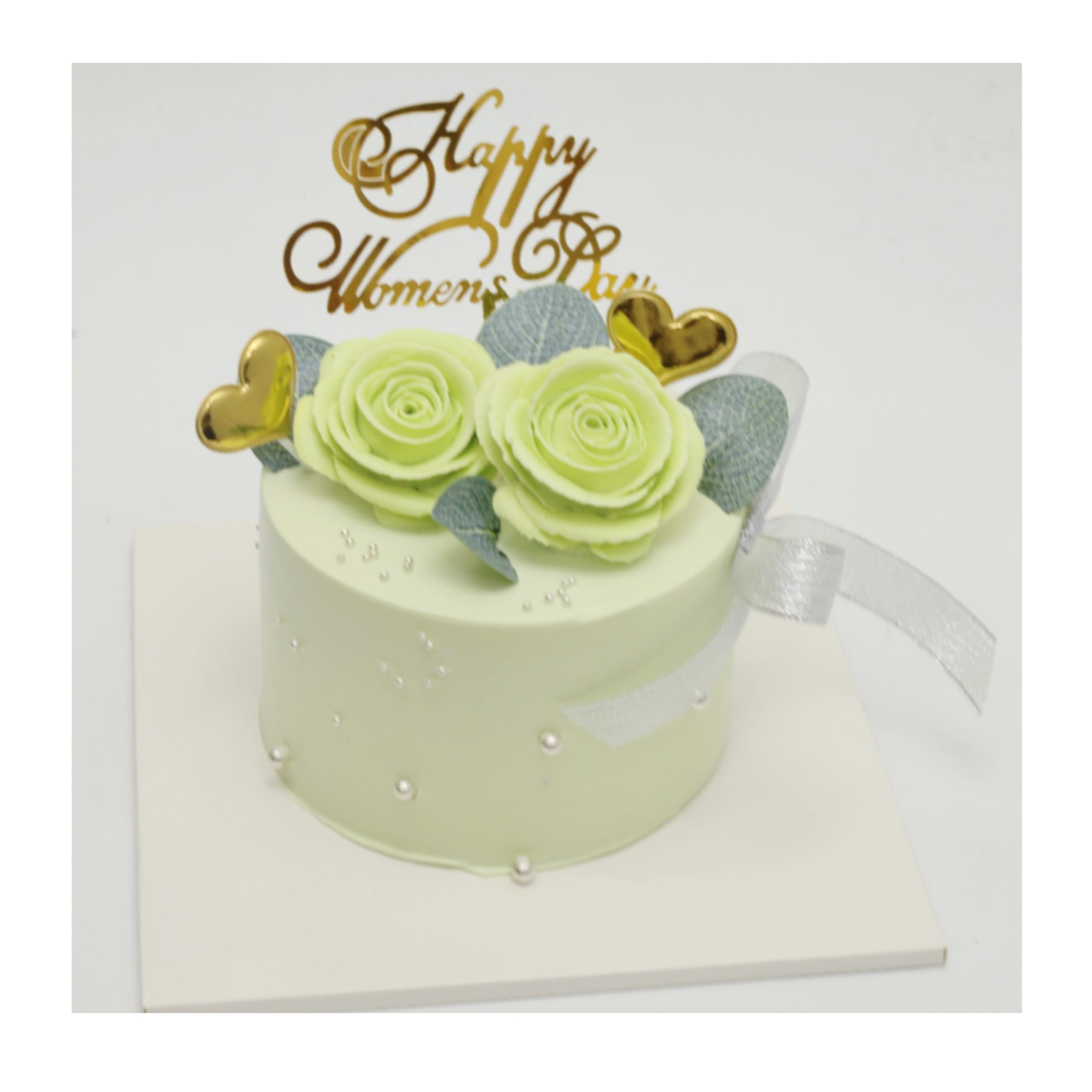 Bánh kem xanh pastel trang trí hoa hồng