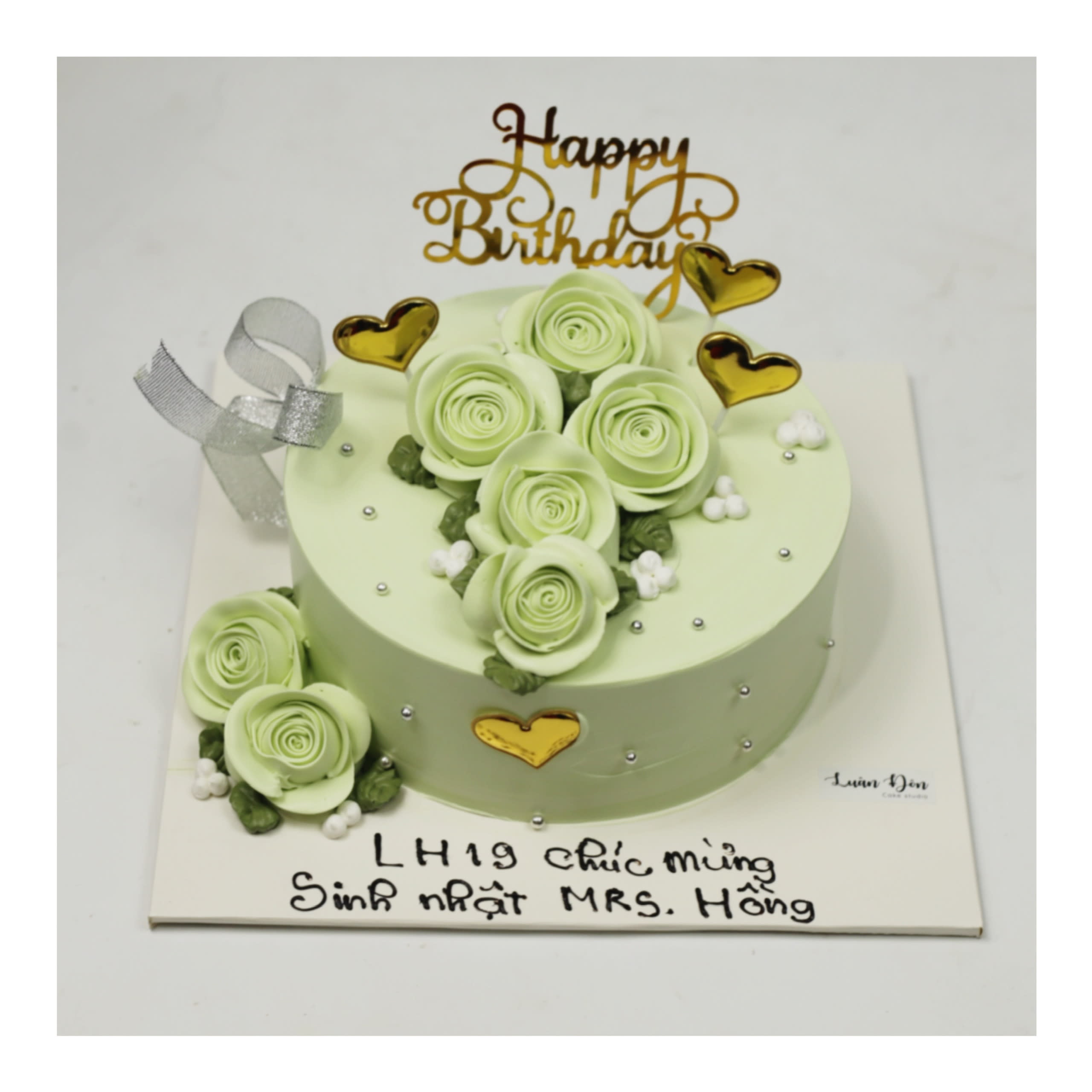 Bánh kem xanh pastel trang trí hoa hồng