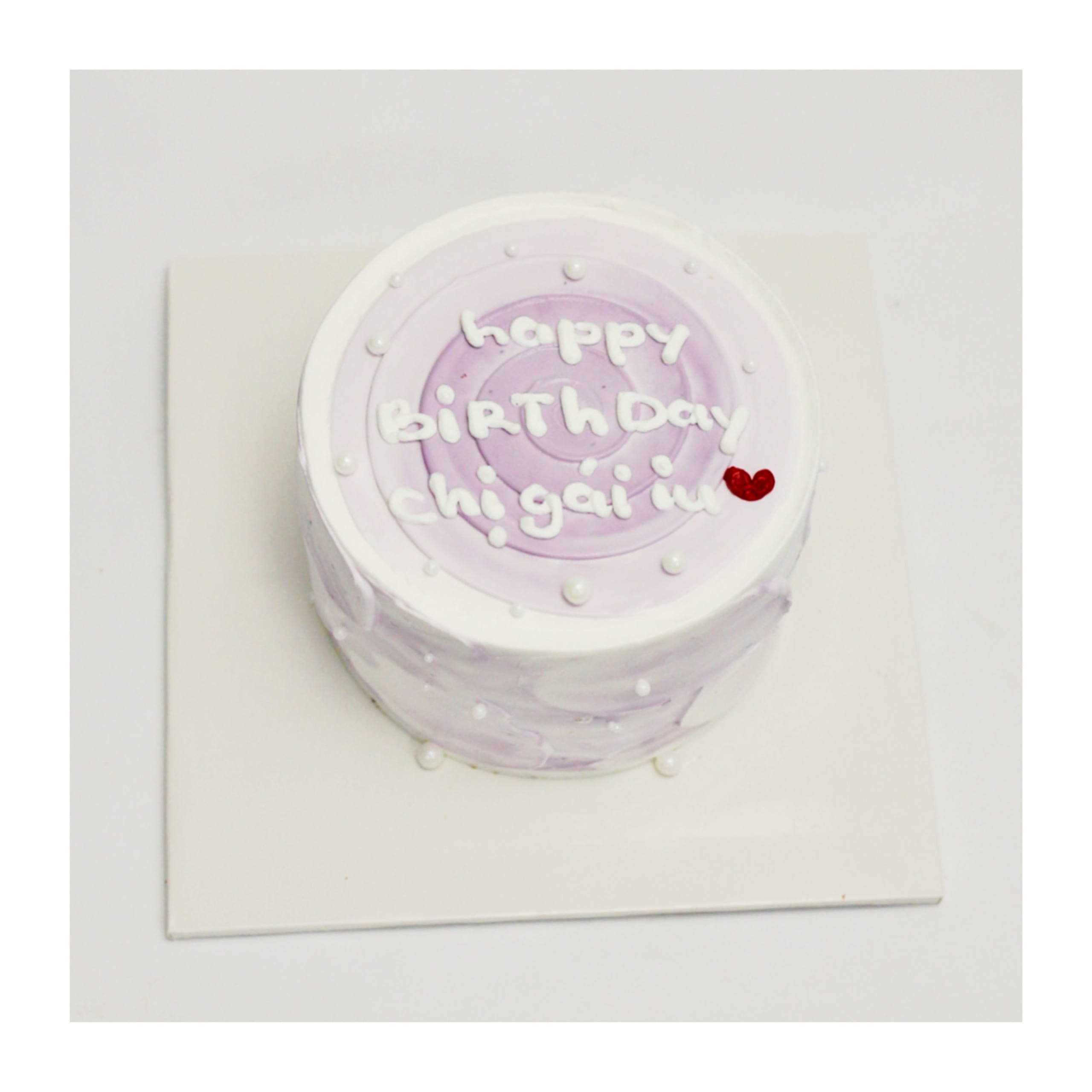 Bento cake màu tím pastel tối giản