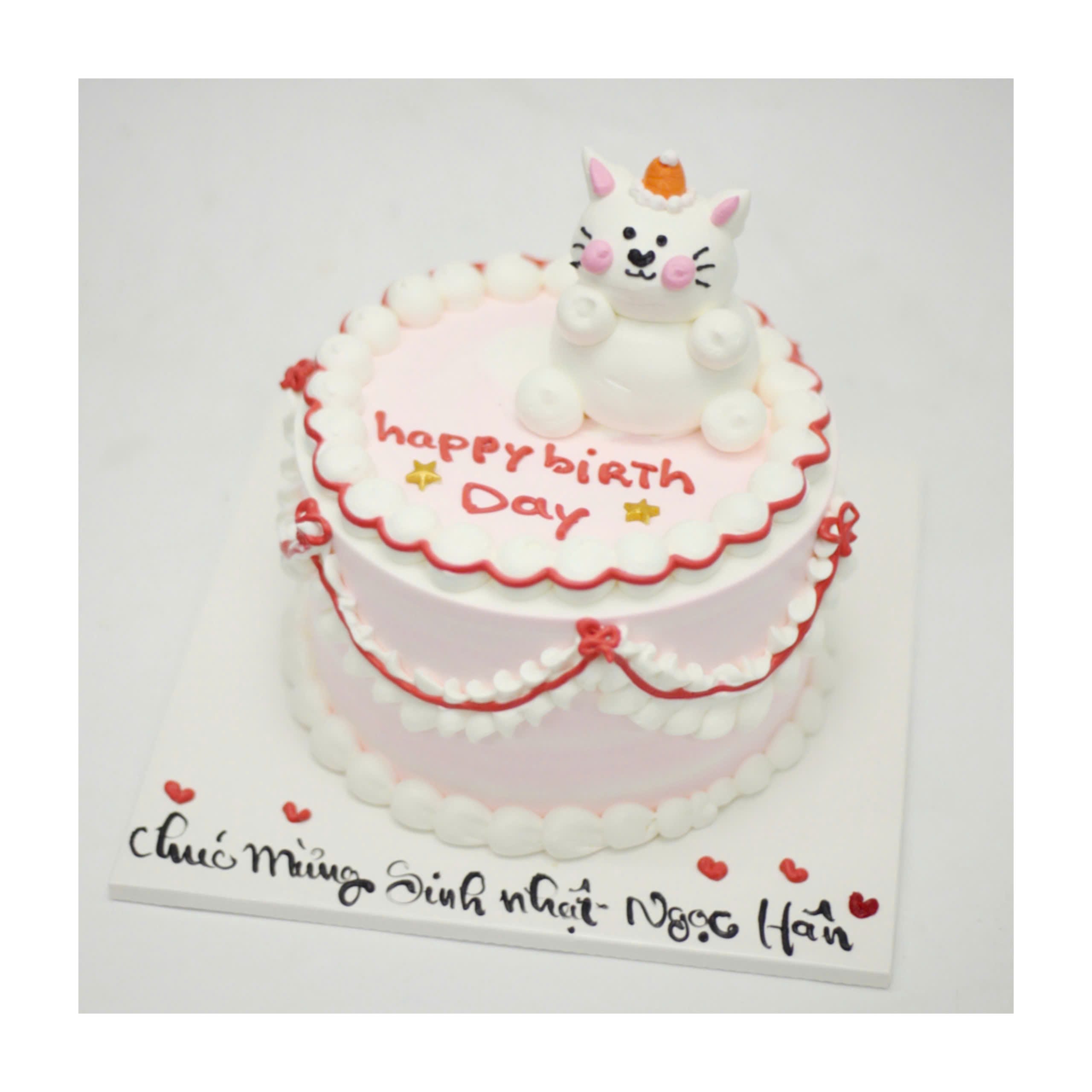 Bánh kem mèo trắng trang trí tông hồng pastel