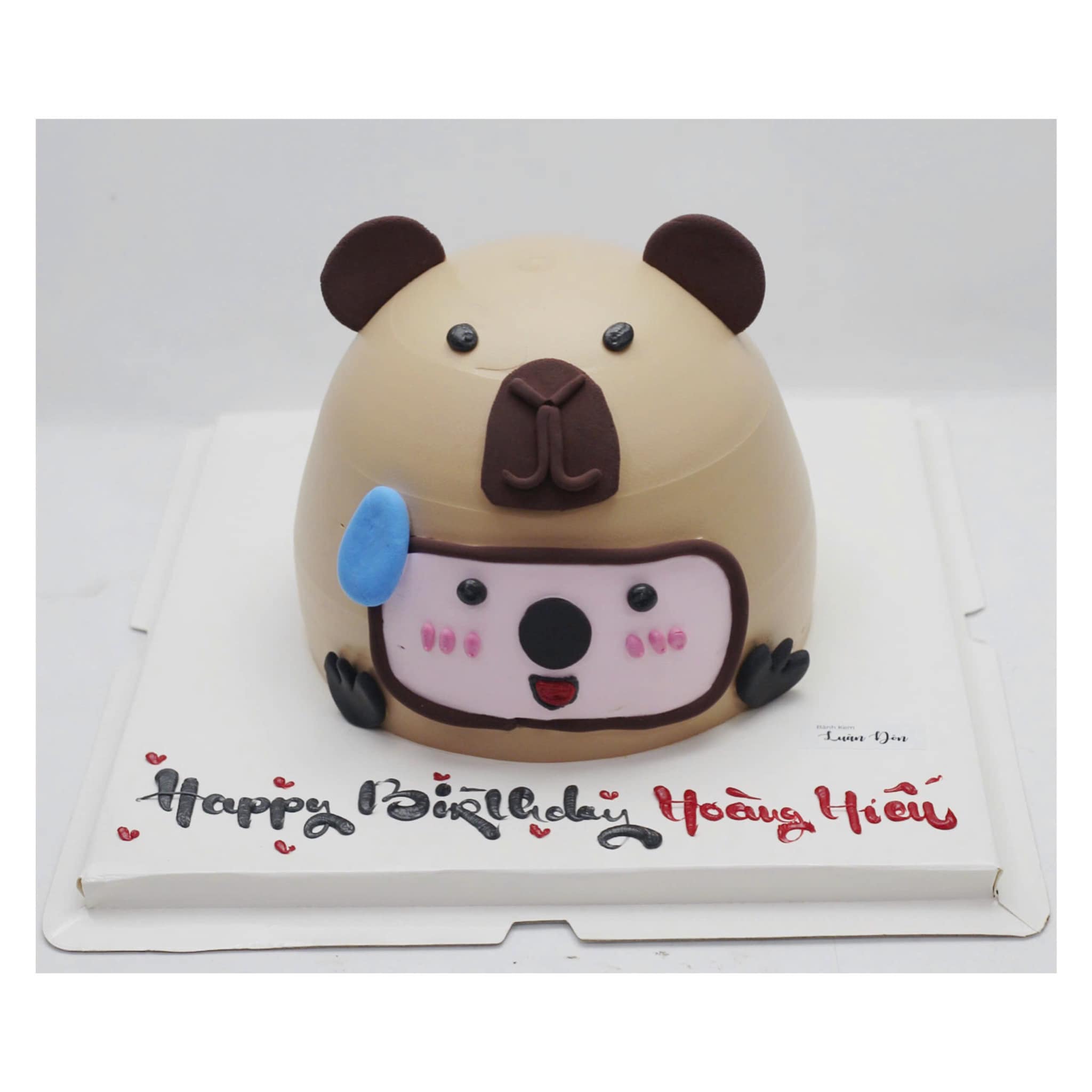 Bánh kem Capybara đeo balo xanh độc đáo