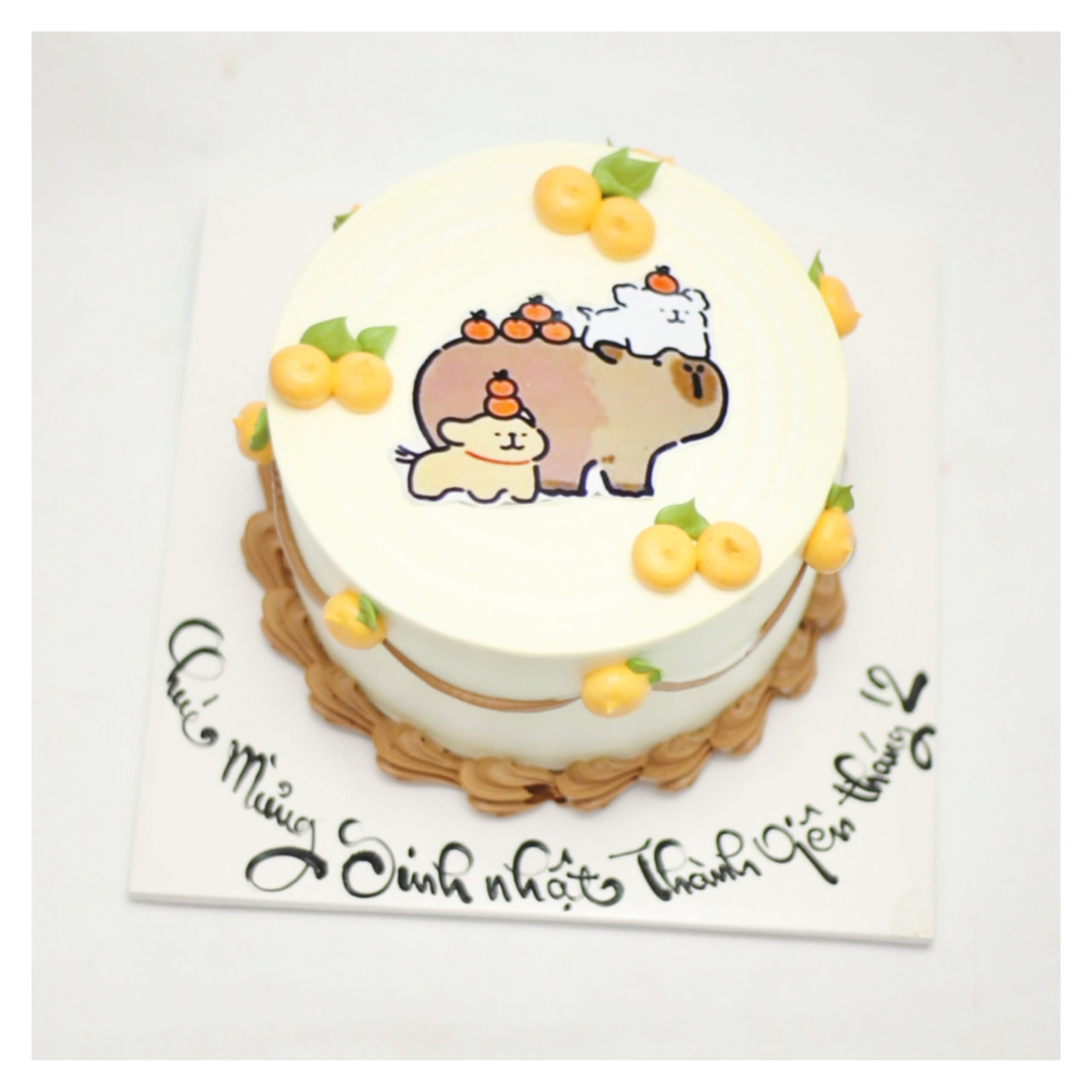 Bánh kem capybara mừng thôi nôi tháng 12