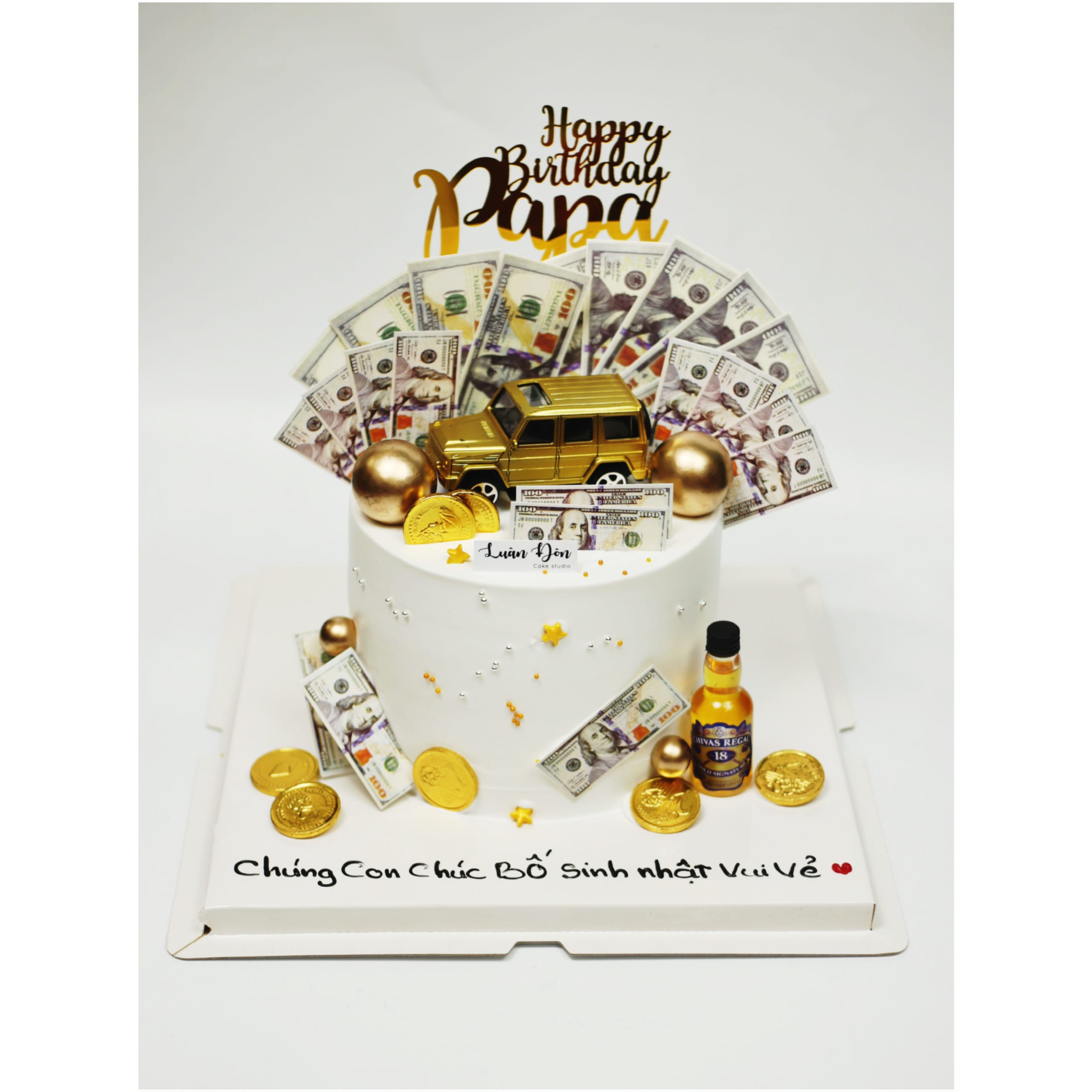 Bánh kem chủ đề tài lộc xe hơi vàng