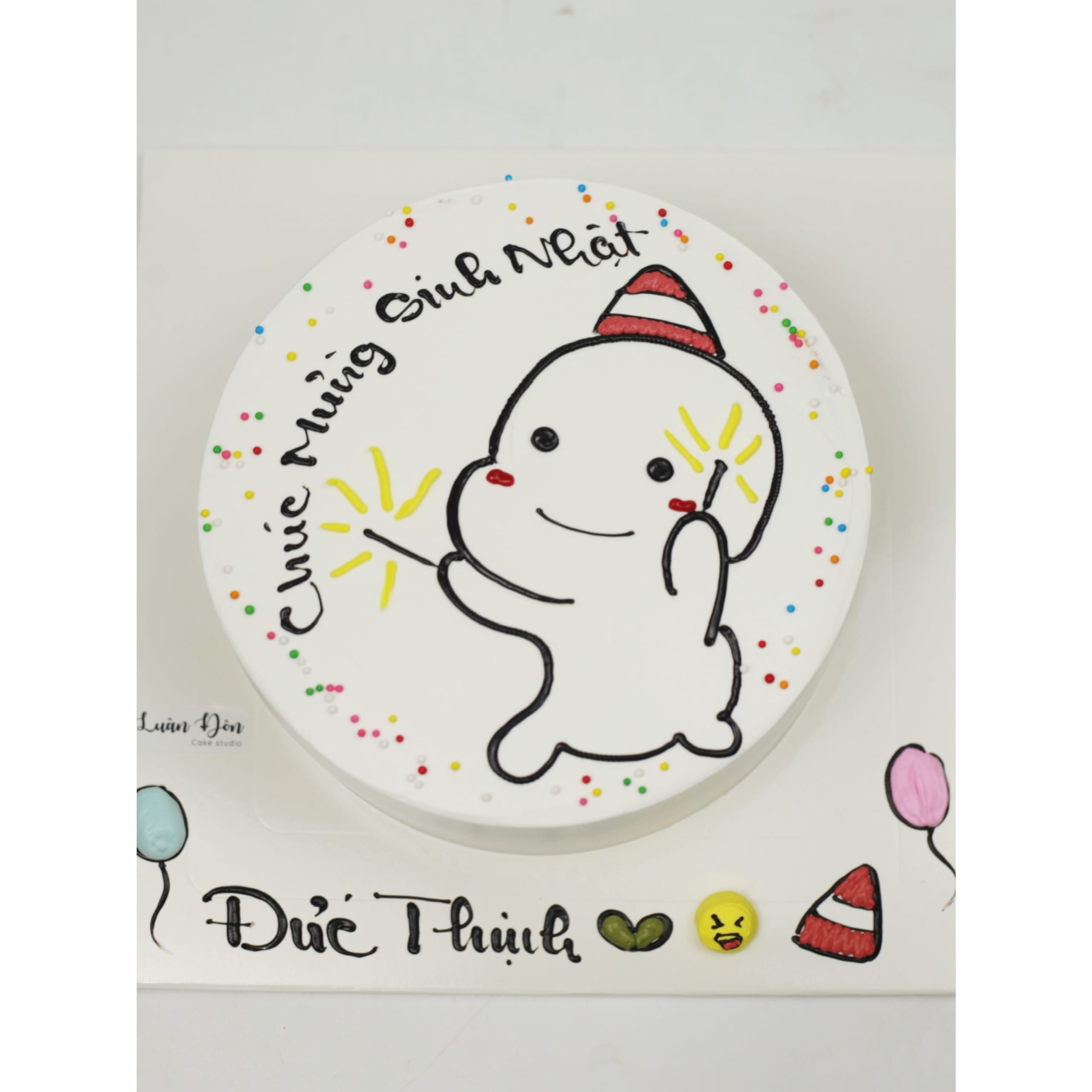 Bánh kem nhân vật chibi cầm pháo sáng