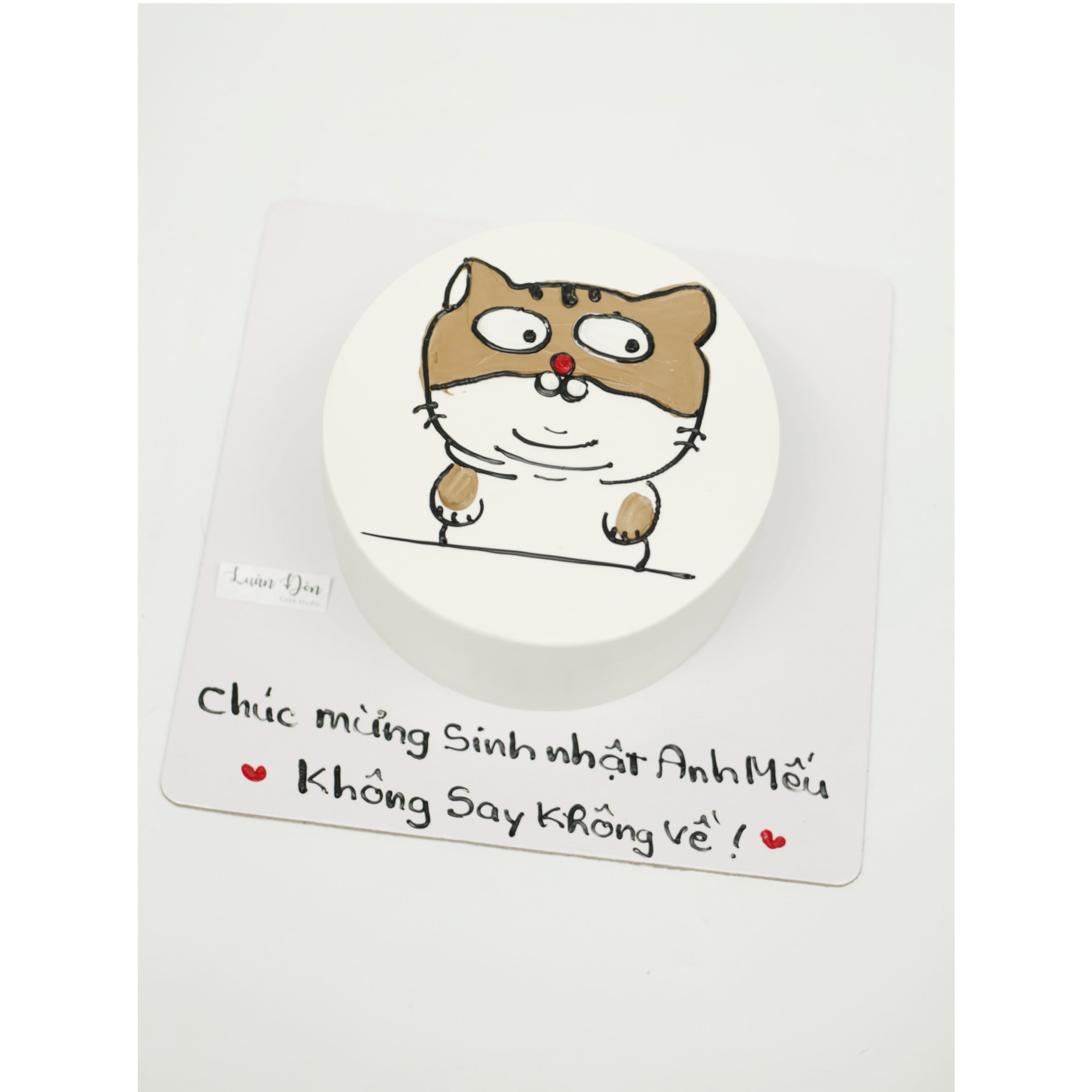 Bánh kem vẽ hình chú mèo đáng yêu