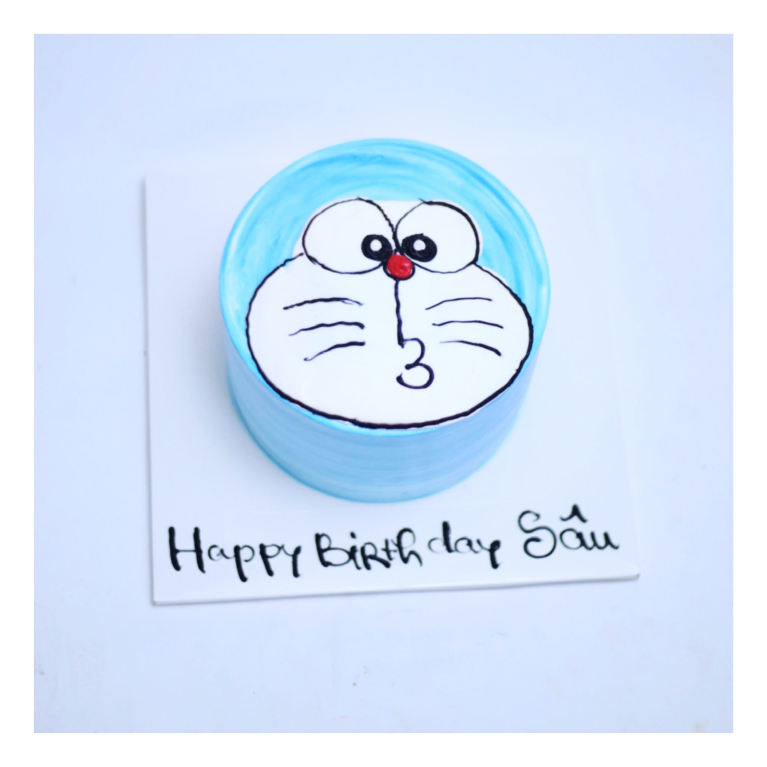 Bánh kem Đô-rê-mon vẽ hình tròn cơ bản