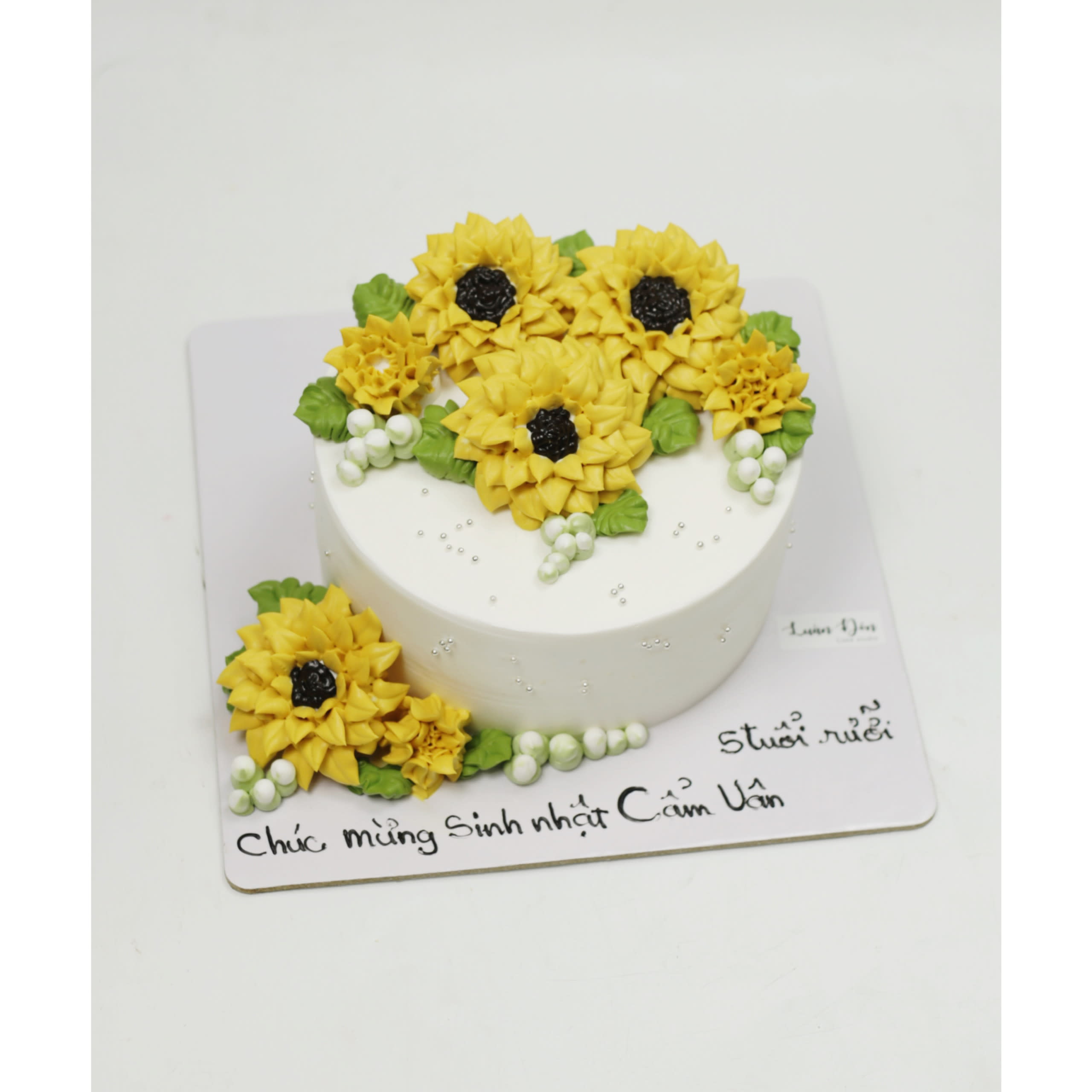 Bánh kem trang trí hoa hướng dương vàng