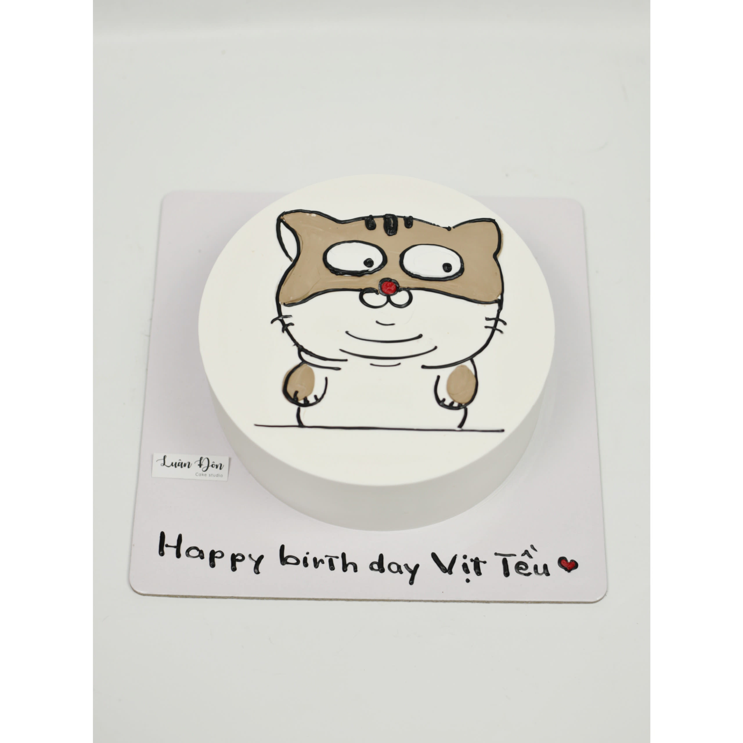 Bánh kem vẽ hình chú mèo hoạt hình dễ thương