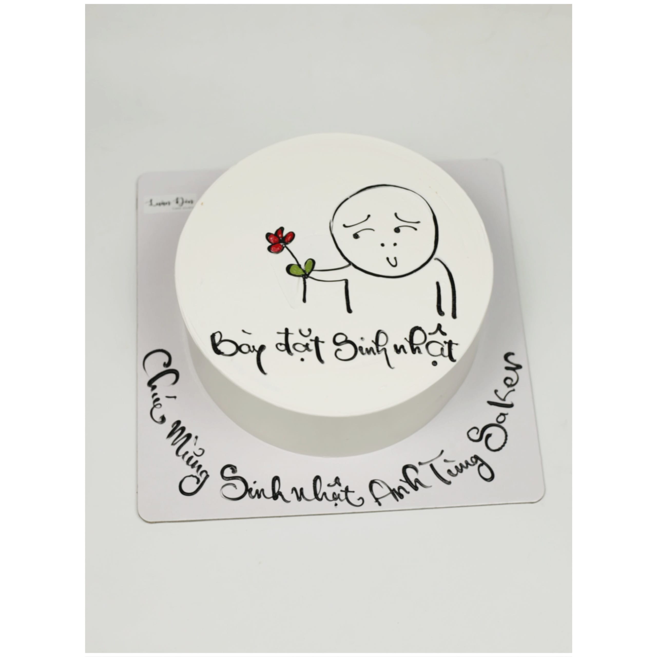 Bánh kem vẽ hình chibi cầm hoa đáng yêu