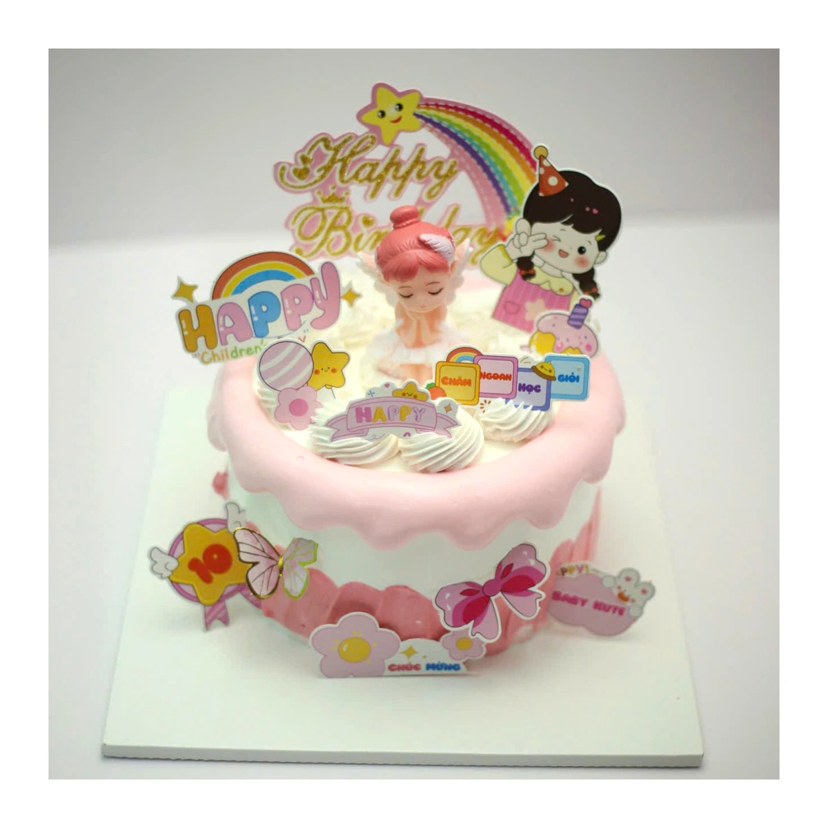 Bánh kem Happy Children hồng chảy đính sticker